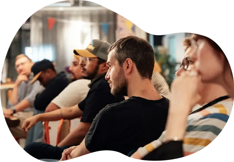 Group of attendees seated and listening during a Housing Works Cannabis Co. community event or workshop.